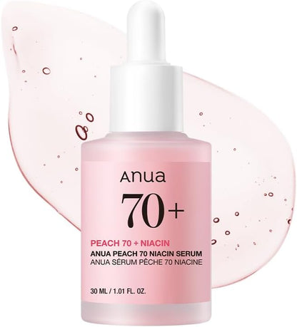 Anua Peach 70+ Niacin serum bottle with dropper on a white background