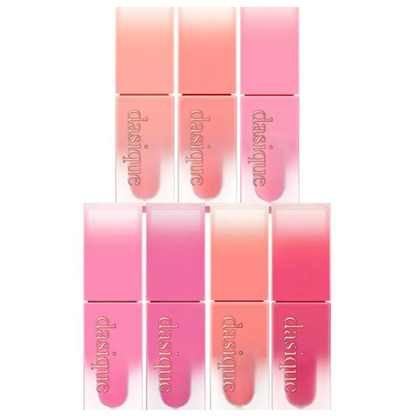 Set of pink lip glosses with 'dasique' branding on a white background