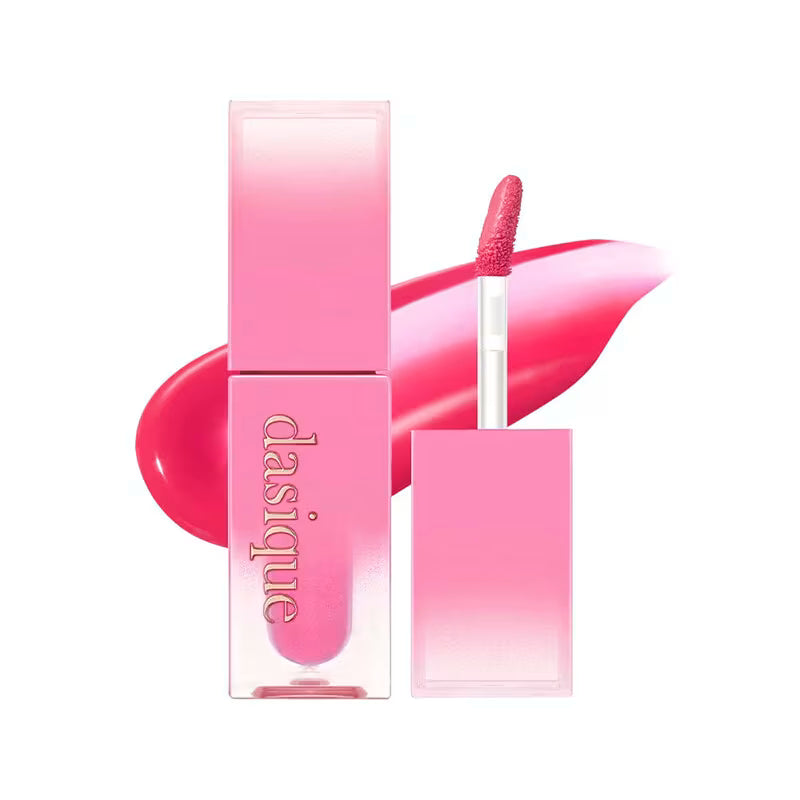 Pink lip gloss set with applicator and packaging on a white background