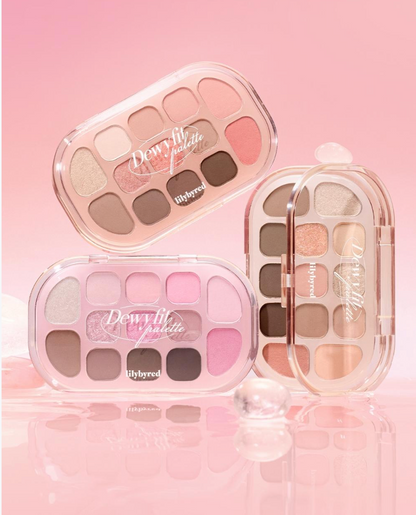 Three makeup palettes with 'Dewy' text on a pink background. Lilybyred Dewy Fit Palette eyeshadow palette for Korean makeup
