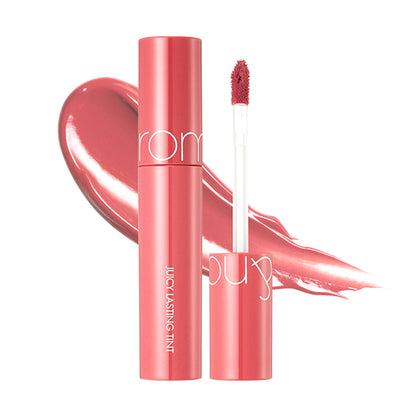 Lip tint with applicator and Rom&nd brand name on a white background