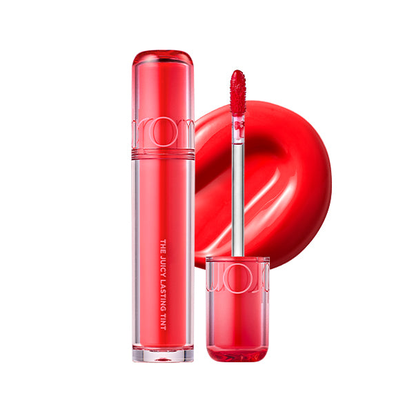 Red lip gloss with applicator and heart-shaped background